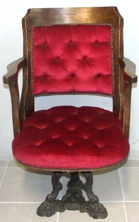 Swivel-chair in oak with cast-metal base, ca 1900.